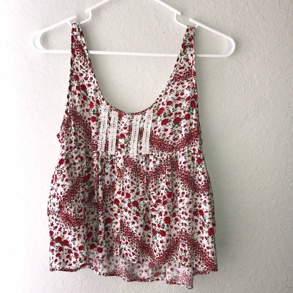 White blouse with red roses